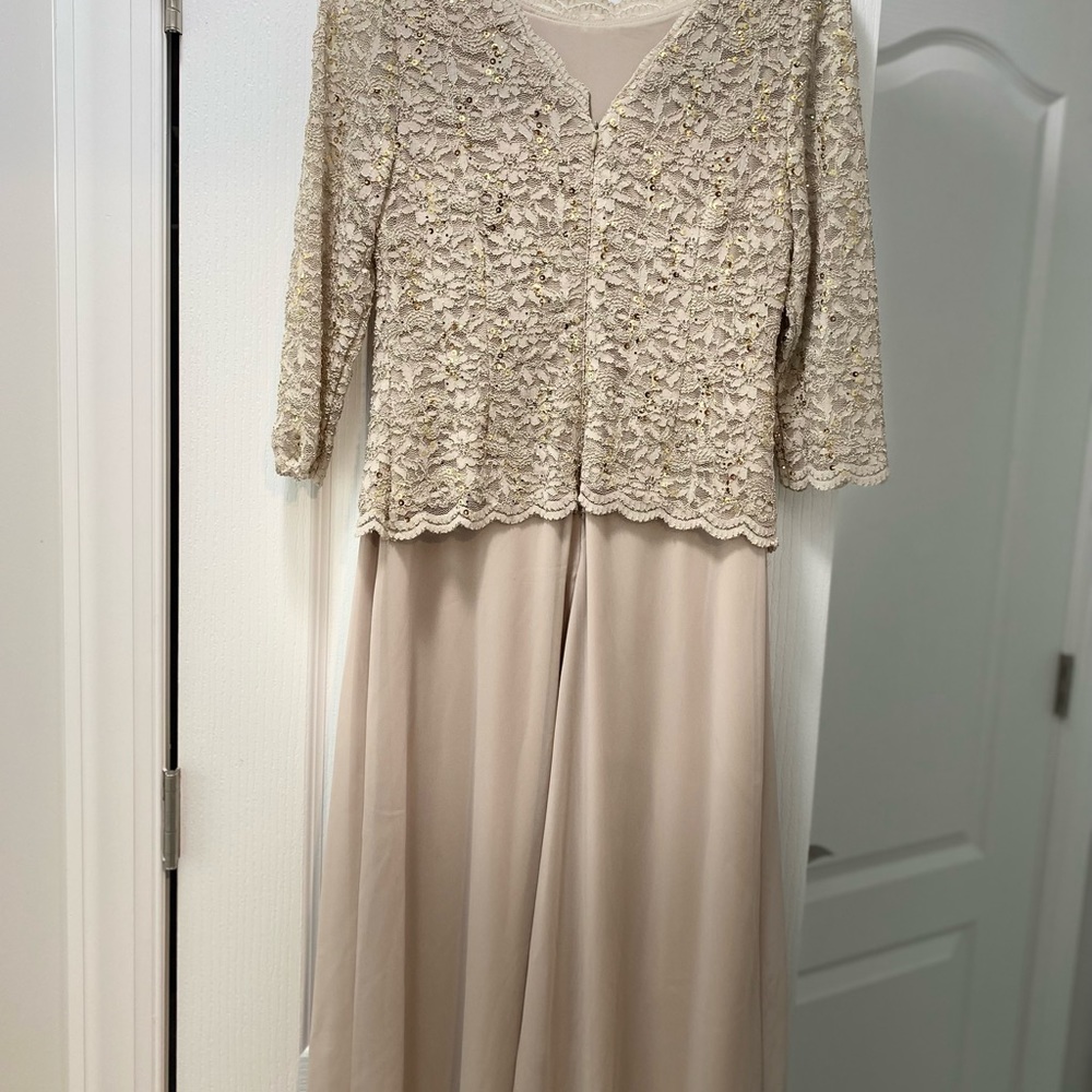 Lace and sheer gown with 3/4 sleeves